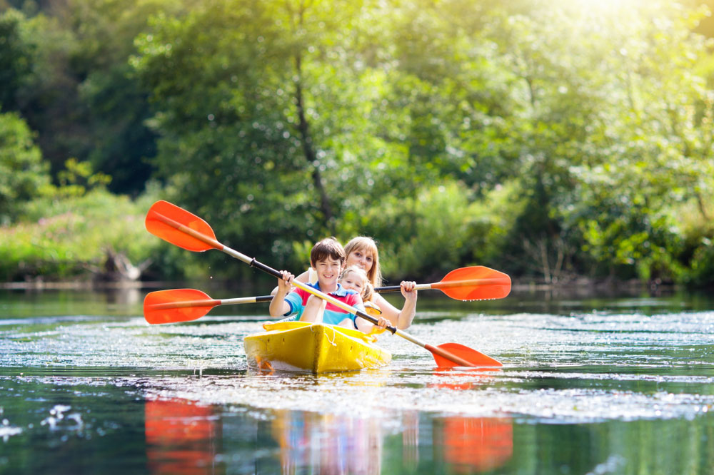 kids kayaking with mom